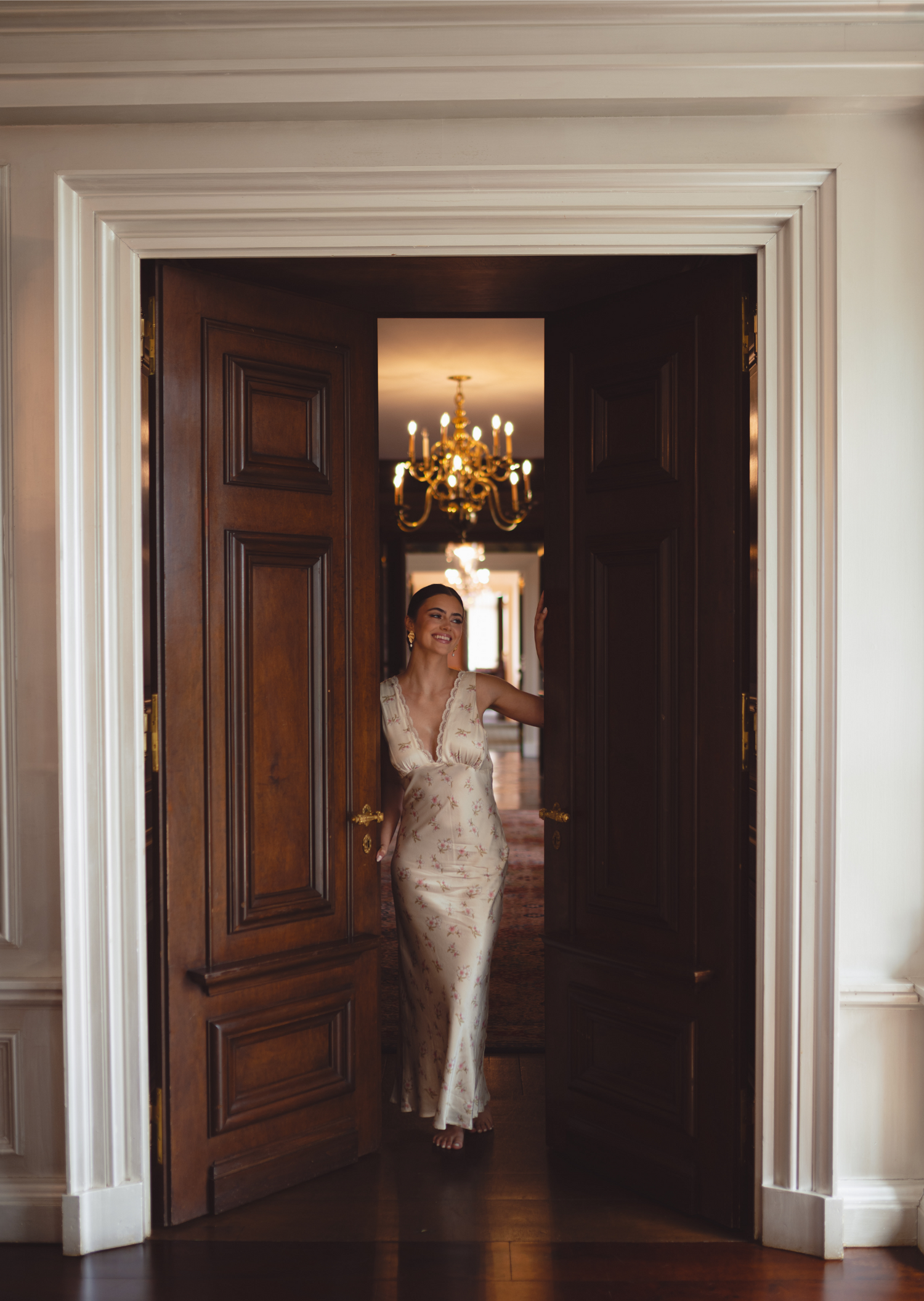 Bride wearing a floral bridal slip dress with lace details
