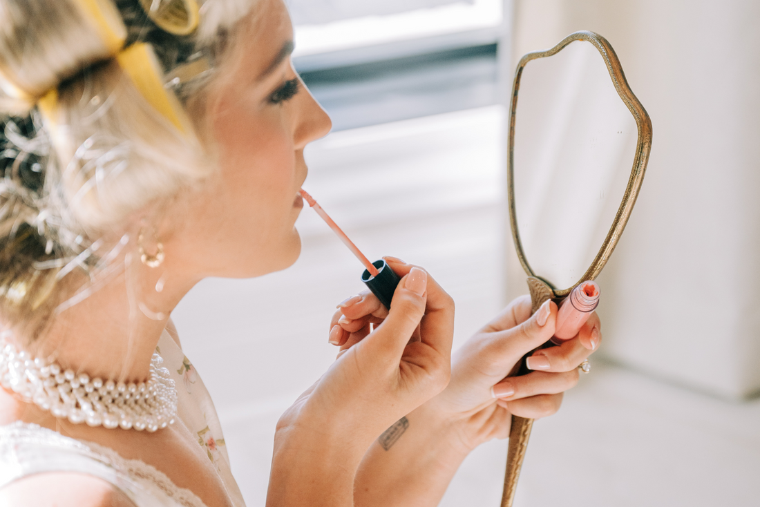 Bride getting ready in a floral slip dress